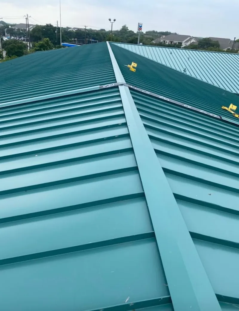 Green commercial metal roof ridge and valley for Metal Roof Repair in Rockford